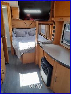 4 berth touring caravan fixed bed