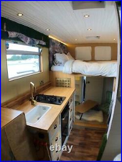 Mercedes sprinter camper van conversion. Kitchen, bathroom and bedroom